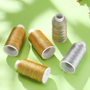 Close-up of metallic gold and silver 6-strand polyester threads for DIY jewelry making