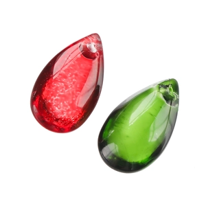Macro detail of red and green water drop glass pendants with top hole for DIY jewelry making