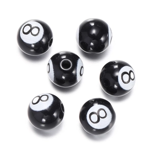 High-quality detail shot of black acrylic 8-ball beads for DIY jewelry making accessories