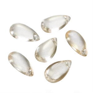 Macro view of teardrop glass beads with champagne gold finish for DIY jewelry