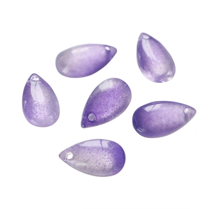 Close-up of six purple waterdrop glass beads with natural texture for DIY jewelry making