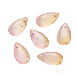 Close-up of 8x14mm teardrop glass beads with gold foil flakes for DIY jewelry making