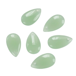 Macro shot of 8x14mm light green teardrop glass beads with smooth polished finish