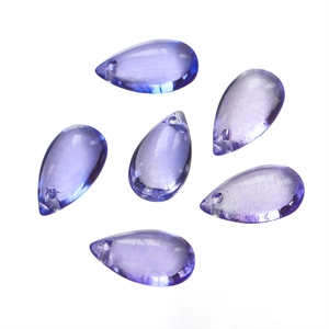 Macro shot of 8x14mm light purple teardrop glass beads with precise top-drilled holes