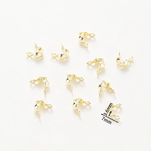 Detail of 7mm gold-plated double-loop bead connectors for DIY jewelry making