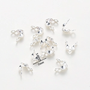 Detailed view of 7mm rose gold plated double bead tips for DIY jewelry making connections
