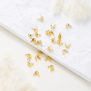 Detail shot of golden plated metal clasp connectors for DIY jewelry making sets