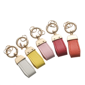 British style double-sided litchi grain leather keychains with golden metal ring in five colors