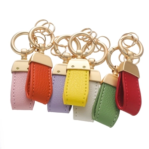 British style double-sided leather keychains with gold metal rings in seven vibrant colors