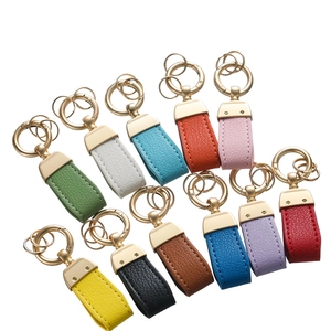 British style double-sided PU leather keychains with gold metal rings in twelve colors