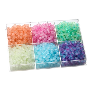 Detail of 8x7mm colorful glass apple beads in a six-compartment acrylic storage box