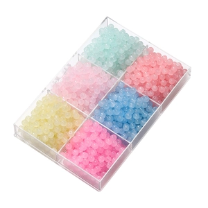 Detailed view of six-grid organizer with colorful 8x7mm apple-shaped frosted glass beads