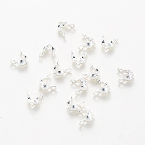 Detailed view of silver-plated copper clasp connectors for handmade jewelry making