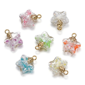 Luminous star-shaped glass pendants with colorful glitter sand and gold metal loops