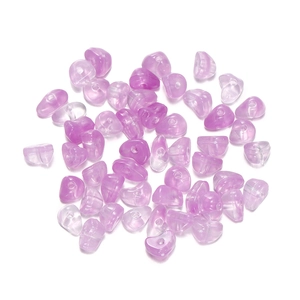 Detail shot of 5-8mm irregular lavender acrylic beads with pre-drilled holes for DIY jewelry