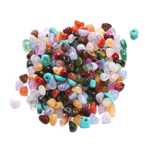 Macro shot of 15-grid assorted irregular resin stone beads for DIY jewelry making