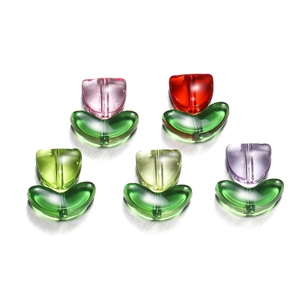 Macro detail of tulip-shaped acrylic beads with pre-drilled holes for DIY jewelry making