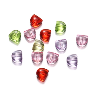 Macro shot of colorful acrylic tulip petals beads with through-holes for DIY jewelry craft