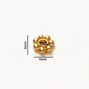 Distanziatori a fiocco d'oro da 6mm con dettaglio del foro centrale da 1,7mm