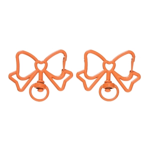 Detail van oranje legering strik-kreeftsluitingen met hartuitsparing voor DIY-werk