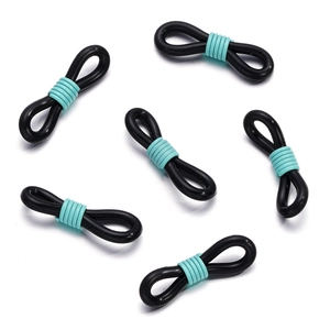 Detail view of black silicone 8-shaped eyeglass chain connectors with blue metal springs