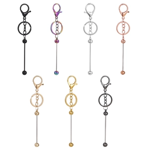 Close-up of DIY beaded keychains in seven metallic colors with lobster clasps and rods