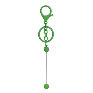 Detail of DIY grass green metal keychain with beadable rod and matte round beads