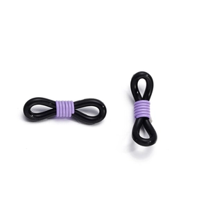 Detail of 8-shape black silicone glasses strap connector with purple metal spring coil