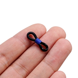 Close-up of flexible black silicone anti-slip glasses strap loop with blue metal spring