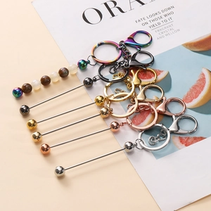 Multi-colored metal DIY beadable keychain bars in gold, rose gold, and silver finishes
