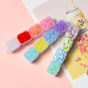 4mm colorful matte peanut acrylic beads in a 4-compartment storage box for DIY jewelry