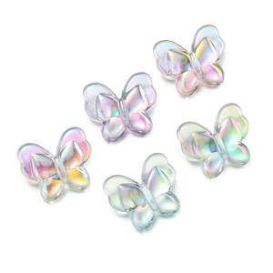Close-up of 22mm iridescent acrylic butterfly beads for DIY jewelry making and crafts