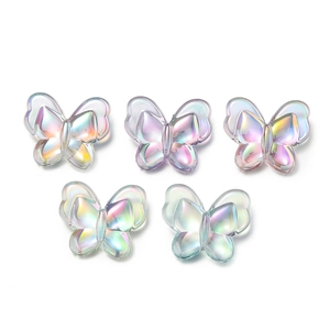 Macro shot of 22mm colorful iridescent butterfly beads for DIY jewelry and hair accessories