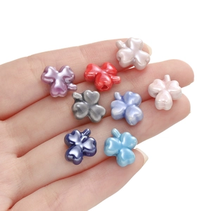 Pearlescent clover ceramic beads for DIY jewelry making in assorted vibrant colors