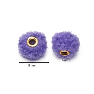 Detail of 18mm purple teddy velvet beads with 4mm gold metal eyelet for DIY crafts