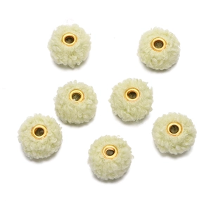 Detailed view of 18mm soft teddy fleece plush beads with golden metal eyelets for DIY
