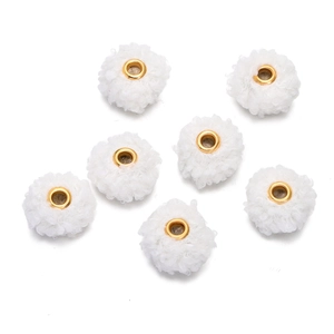 Macro shot of 18mm white teddy plush beads with gold metal eyelets for DIY jewelry crafts