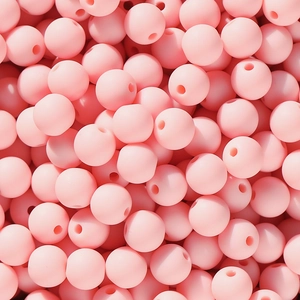 Makroaufnahme matter rosa Acryl-Bonbonperlen mit Löchern für DIY-Schmuckherstellung