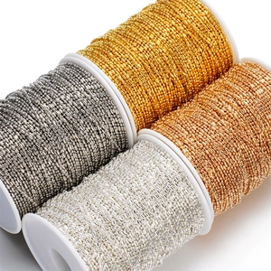 DIY metal ball chains in four metallic colors wound on white plastic spools for jewelry making