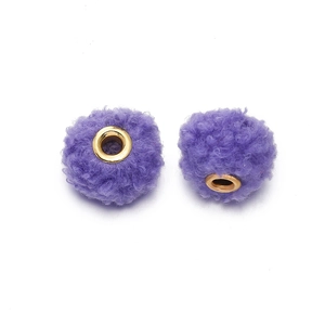 Detail of 18mm purple teddy fleece beads with large gold metal holes for DIY jewelry