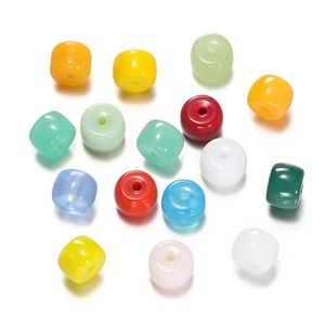 Close-up of colorful cylindrical glass beads for DIY jewelry making and bracelets