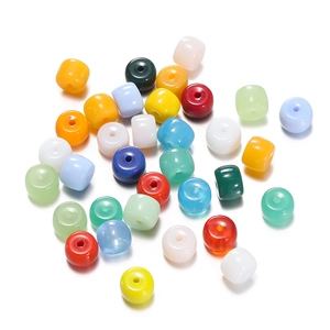 Macro shot of colorful cylindrical glass beads for DIY bracelet and jewelry making
