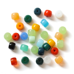 Macro view of multi-colored cylindrical glass beads for DIY bracelet and necklace making