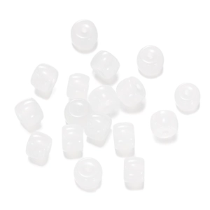 Detail view of smooth white cylindrical spacer beads for DIY jewelry making and crafts