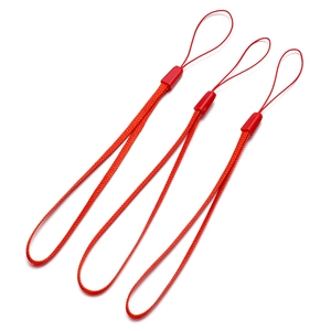 Close-up of three red braided nylon lanyards with plastic connectors on white background