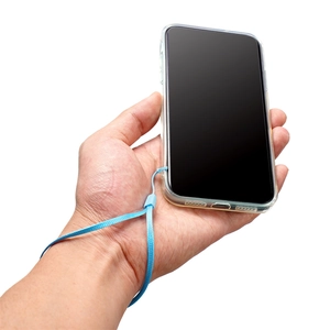 Light blue woven nylon phone lanyard with adjustable clip on a clear phone case