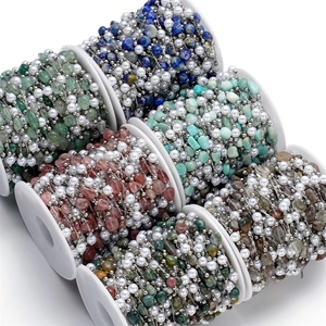 Detail of colorful gemstone chips and faux pearl stainless steel chains for DIY jewelry making