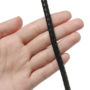 Close-up of 3mm-5mm black braided genuine leather cord for DIY jewelry making
