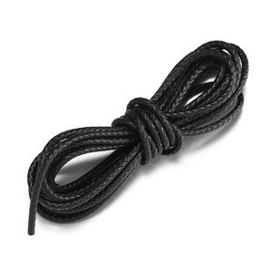 Macro shot of 3mm-5mm black braided leather cord rolls for DIY jewelry making and crafts