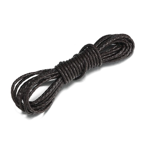 Macro detail of dark brown braided leather cord texture for handmade DIY jewelry